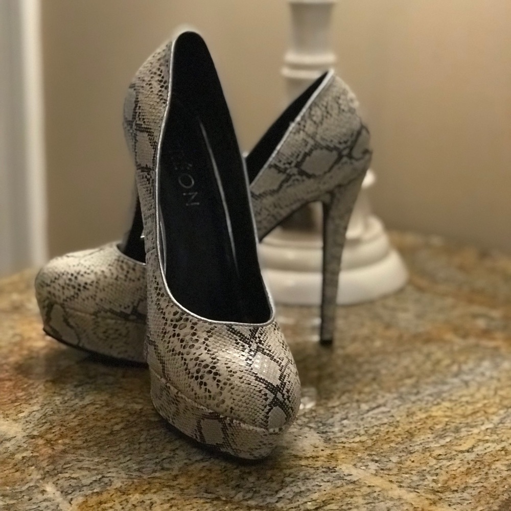 Size 8.5 Dereon Snake Skin Heels.  Like new!